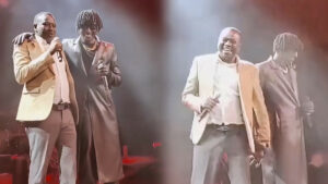 Yaririmbye indirimbo y’Imana! Amashusho umuhanzi Devis D mu gitaramo cye yazanye Papa we kuri stage asuhuza abantu nawe arabaririmbira – video